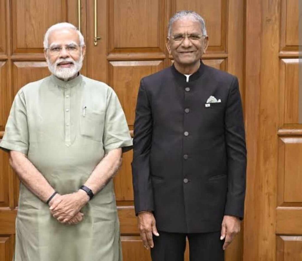 Govind Dholakia with PM Narendra Modi